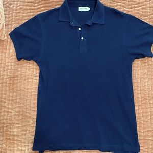 Navy blue pique polo by Taylor Stitch.